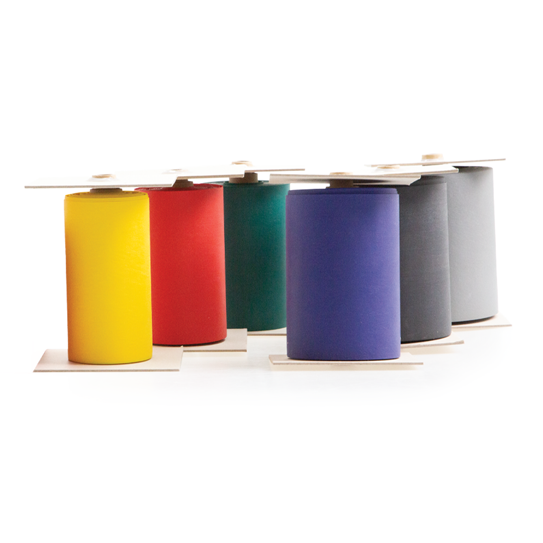Five spools of ribbon in yellow, red, green, blue, and gray on a white background