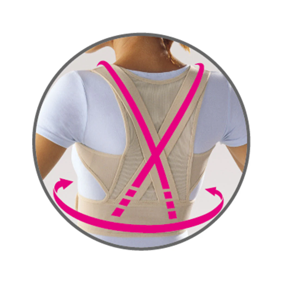 Beige posture corrector with pink straps on a person wearing a white shirt.