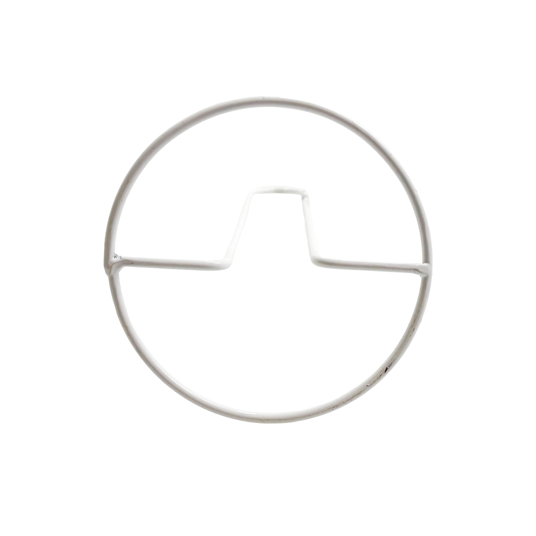 Metallic circular object on a white background